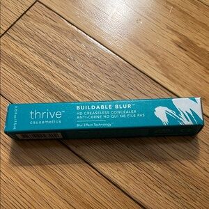 Thrive buildable blur creaseless concealer in Very Deep (warm)